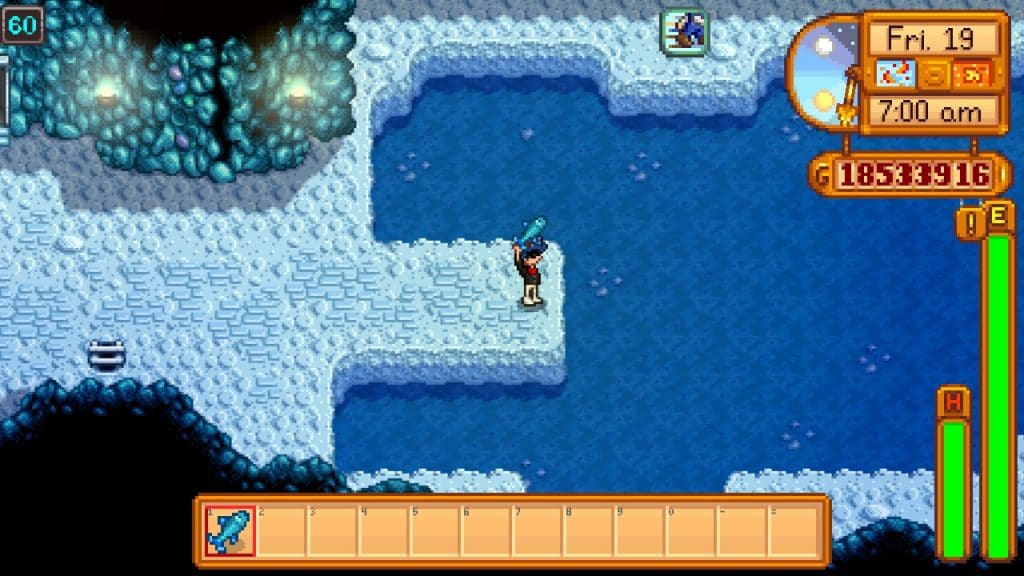 The player holding an Ice Pip at the Mines.