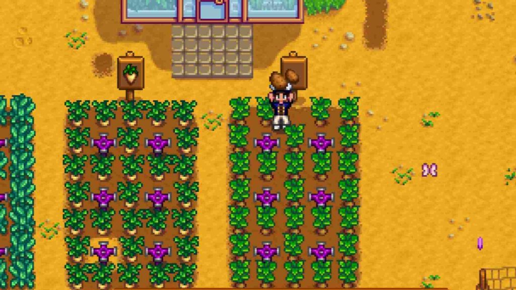 A player surrounded with potatoes in Stardew Valley.
