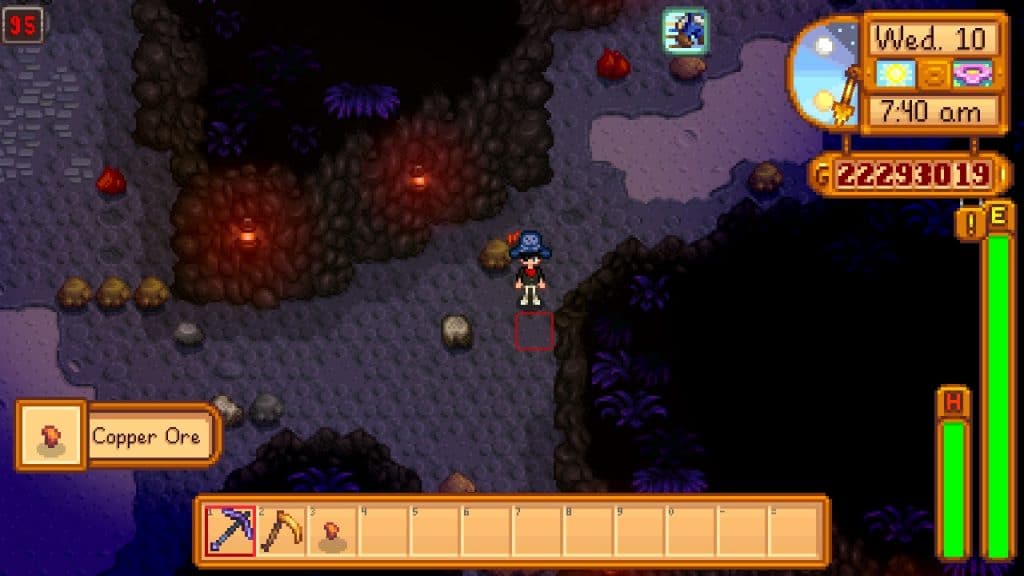 A player venturing through the mines in Stardew Valley.