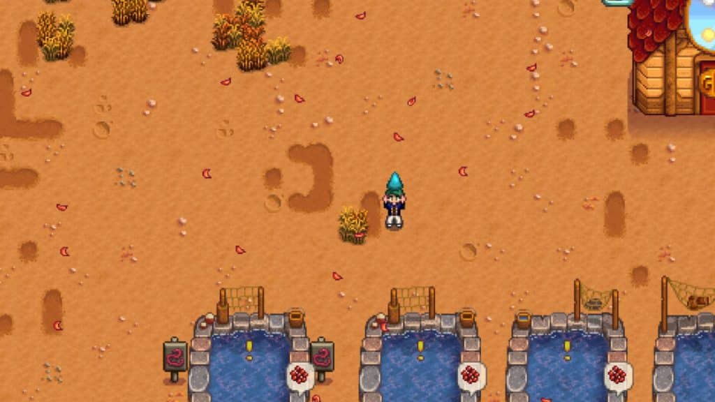 A player holding a frozen Geode in Stardew Valley.